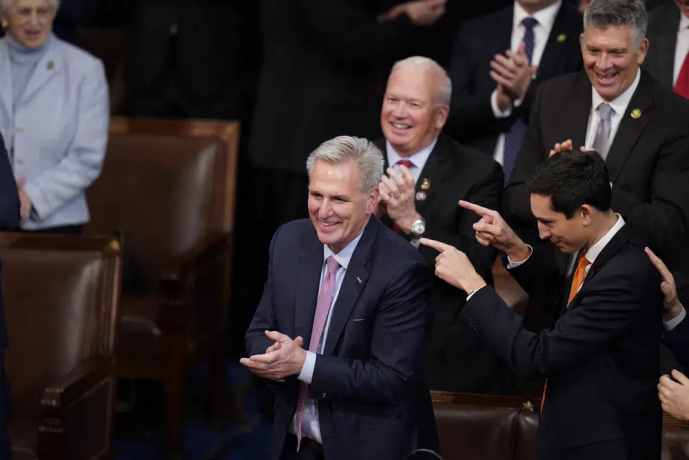 Rep. Kevin McCarthy, R-Calif., smiles after winning the 15th vote in the House chamber as the House enters the fifth day trying to elect a speaker and convene the 118th Congress in Washington, early Saturday, Jan. 7, 2023.  AP/RSS Photo